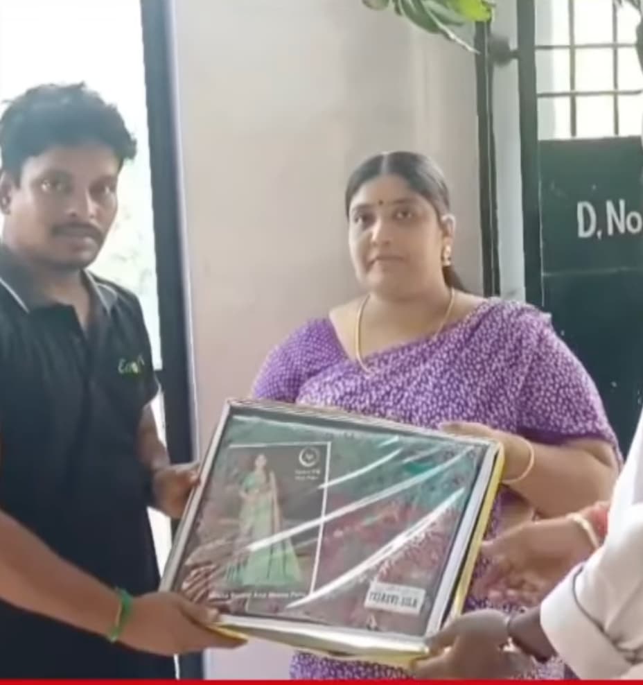 Women receiving sarees on Rakhi Purnima
